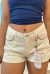 Shorts Consciência Jeans Feminino Mom com Detalhe de Aplicação Ana Castela Off White - comprar online