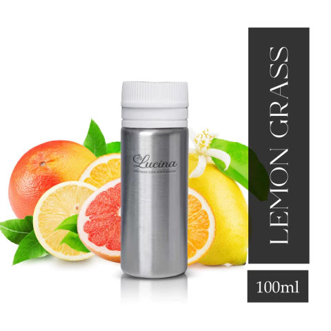 Frasco de fragancia Lemon Grass de 100 ml con frutas cítricas de fondo.