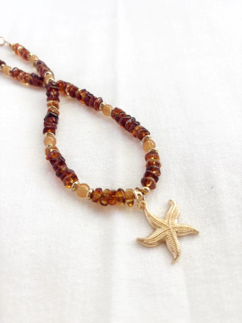 COLLAR AMULETO "ELEMENTOS" CON ESCALLAS Y DIJE ESTRELLA - comprar online