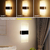 Luminária de parede com sensor interno e carregamento USB