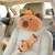 Capivara de pelúcia para encosto de cabeça - comprar online