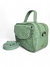 Bolsa feminina transversal baú média na cor verde menta, feita em couro legítimo, com alça e detalhes em metal.