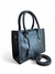 Bolsa feminina tiracolo média em couro sintético, cor preta, com detalhes em costura lateral e alça removível.