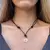 COLAR COURO PRETO NOSSA SENHORA CRAVEJADO BANHADO OURO - comprar online