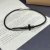 PULSEIRA COURO PRETA CRUZ FINA BANHADO RÓDIO NEGRO na internet