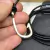 PULSEIRA COURO PRETO ANZOL BANHADO OURO - loja online