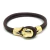 PULSEIRA COURO MARROM LISA CAVEIRA BANHO OURO