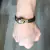PULSEIRA COURO MARROM LISA CAVEIRA BANHO OURO - comprar online