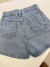 SHORT JEANS BRILHO FIK na internet