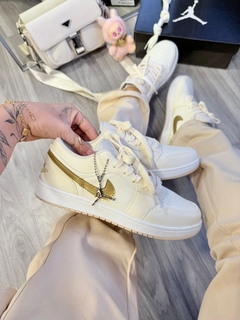 Jordan Low - Manteiga/Dourado na internet