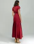 Mulher vestindo Vestido Midi Fluido Marsala Nocturne Charm, visto de costas, com abertura nas costas e saia fluida, combinando com sandálias douradas.