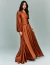 Vestido de festa longo com uma manga bufante na cor ferrugem, modelo Rusty Santorini, ideal para ocasiões especiais.