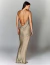 Vestido de festa longo com saia sereia de cetim na cor champagne, visto de costas ideal para madrinha de casamento, para convidada de casamento, convidada de formatura