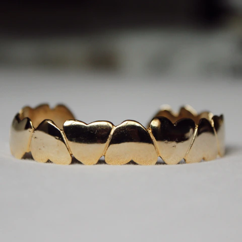 Pulsera corazones invertidos