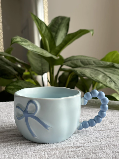 Taza moño celeste