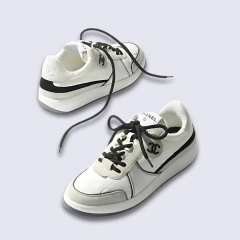 ZAPATILLAS CHANEL - BLANCA C/NEGRO - DOCE SOLES