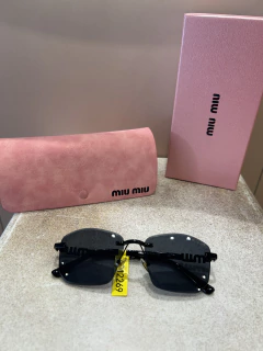 GAFAS MIU MIU E40