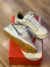 Nike Dunk bege e dourado na internet