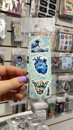Planchita de 13x5 cm. 3 stickers de 4 cm