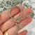 ARGOLA CHAVEIRO ITALIANO COM CORRENTE 25MM DE FERRO DOURADO/PRATA na internet