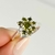Anillo flor en zirconias