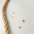 Colar fio de nylon com olho grego em madrepérola - comprar online