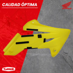 CACHA LATERAL IZQUIERDO TANQUE HONDA TORNADO AMARILLA en internet
