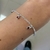 Pulseira de Prata 925 Mini Corações Zircônias Vermelhas - comprar online