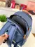 Mochila Euforia + billetera Manuel - tienda online