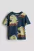 Remera H&M Dinos