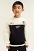 Buzo H&M x Reebok con frisa