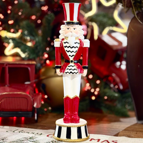 NATAL QUEBRA NOZES EM RESINA VERMELHO COM LISTRAS BRANCO 38CM