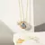 COLAR OVAL ESTRELAS DE CRISTAL LONDON BLUE E ZIRCÔNIAS BRANCAS 50CM - comprar online