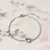 PULSEIRA RIVIERA OVAL INTEIRA CRAVEJADA COM CRISTAL BERILO E ZIRCÔNIAS BRANCAS 19CM - comprar online