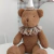 Urso Teodor com Chapéu de Aniversário extra G - loja online