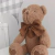 Urso Teodor love com laço