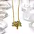 Imagen de Conjunto de cadena con dije en acero dorado quirúrgico