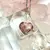 Dije corazoncito de piedra semipreciosa con virola