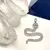 Dije Serpiente con cristales en acero - comprar online