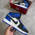 FN - Bota Air Jordan 1 Mid Azul, Branco e Preto - comprar online