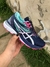 Asics Gel Revelation Marinho com Rosa na internet