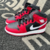 FN - Bota Air Jordan 1 Mid Vermelho com Preto - comprar online