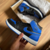 FN - Bota Air Jordan 1 Mid Preta com Azul - comprar online