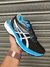 Asics Gel Revelation Preto com Azul na internet