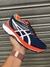 Asics Gel Revelation Marinho com Laranja na internet