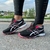 Asics Gel Revelation Preto com Rosa na internet