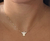 Gargantilha com pingente de Espírito Santo em Madre Pérola - comprar online