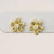 Brinco Flor Vazada Miolo Brilhante Banhado em Ouro 18k - loja online