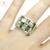 Anillo Plata Y Oro Ancho con Piedras Blancas Y Verdes cod1177 - comprar online