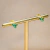 Brinco Triangular Dourado com Pedra Verde Larissa - comprar online